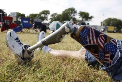 Reuters photo of a patriot, who happens to be an amputee, enjoying the show.